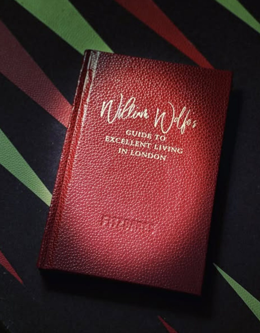 The red leather-bound Guide to Excellent Living in London